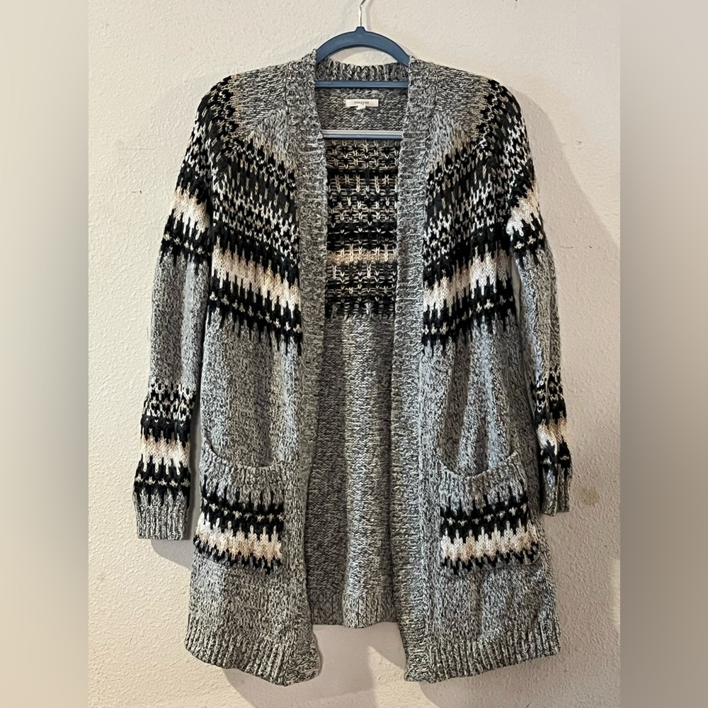 Preloved warm cardigan with winter colors.